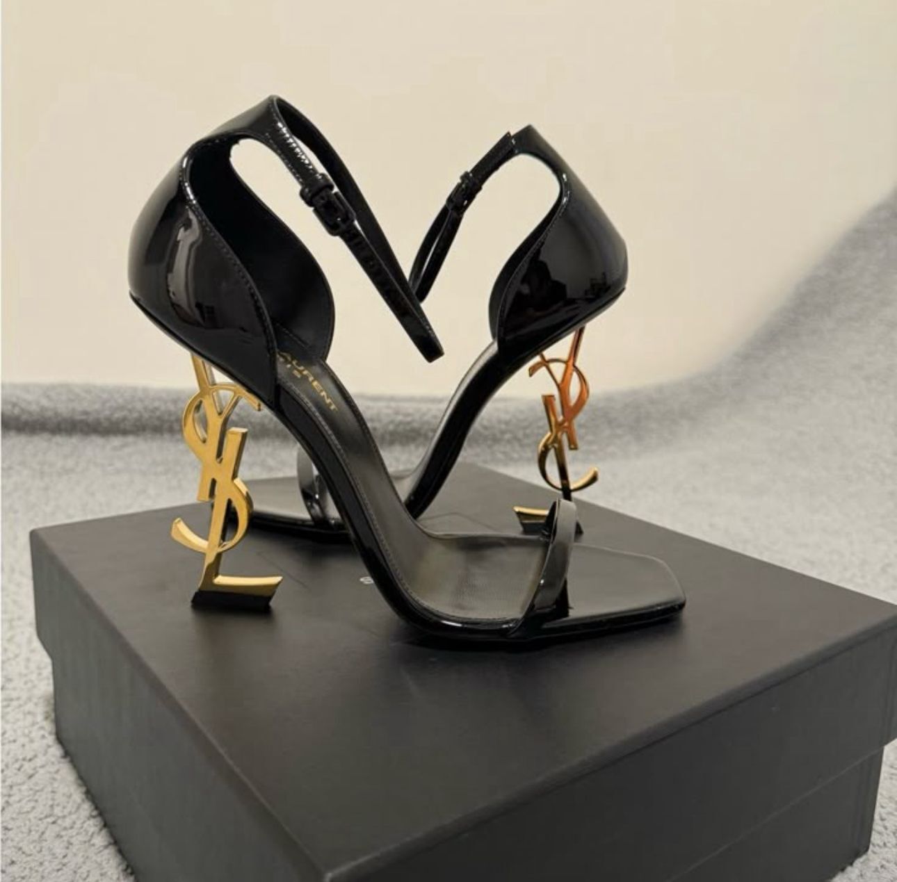 YSL Logo-Heel Sandals in gold hardware